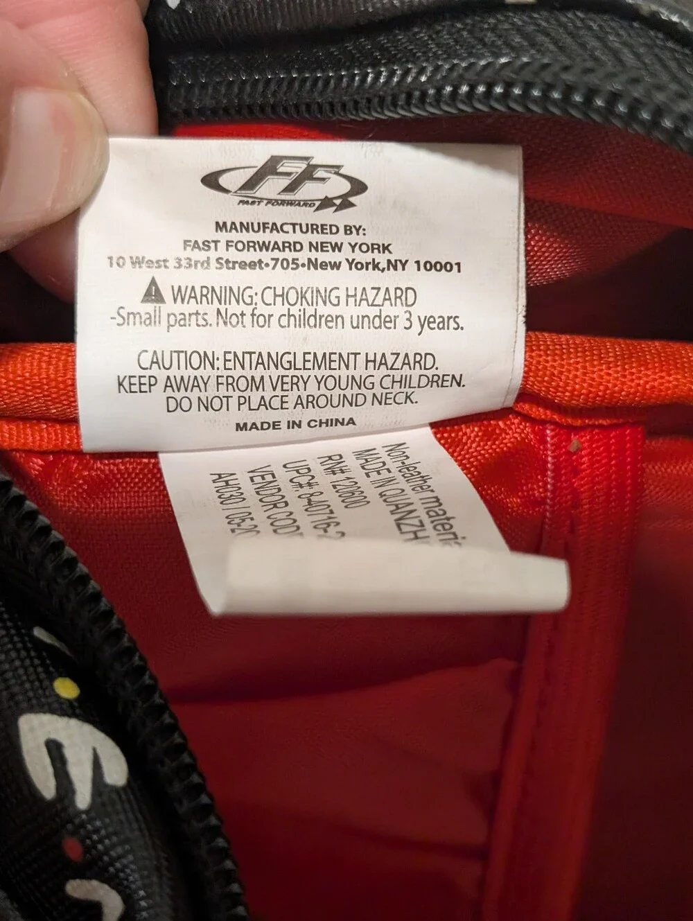 Friends Backpack all over print. need small repair see zoomed in photo